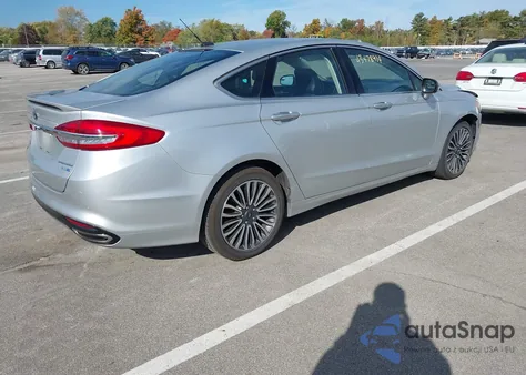 2018 Ford Fusion Titanium z USA, uszkodzony, nr VIN 3FA6P0D9XJR212281